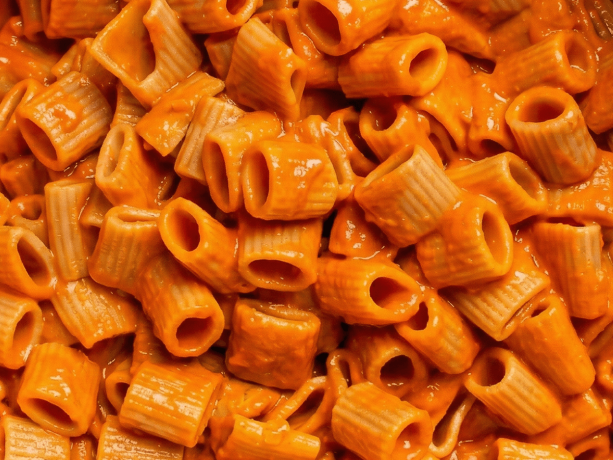 Vitto Free From Oat Mezzi Rigatoni cooked in tomato sauce, gluten free pasta made with oat flour